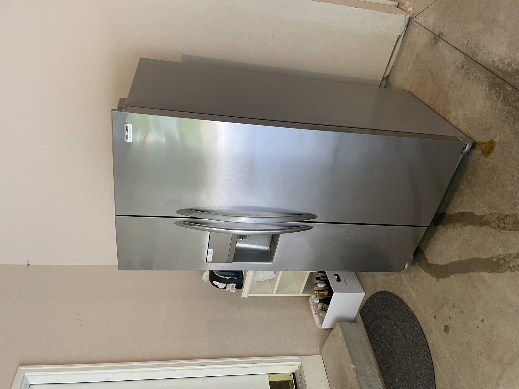 Stainless steel refrigerator inside a customer property.