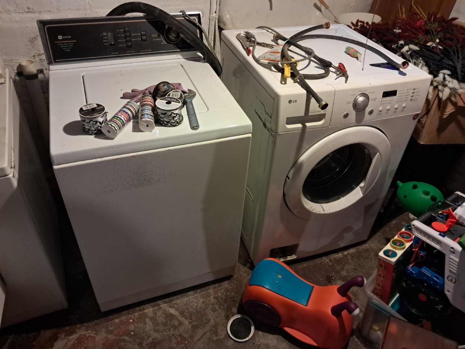 Washer and dryer inside a Clear The Clutter customer basement.