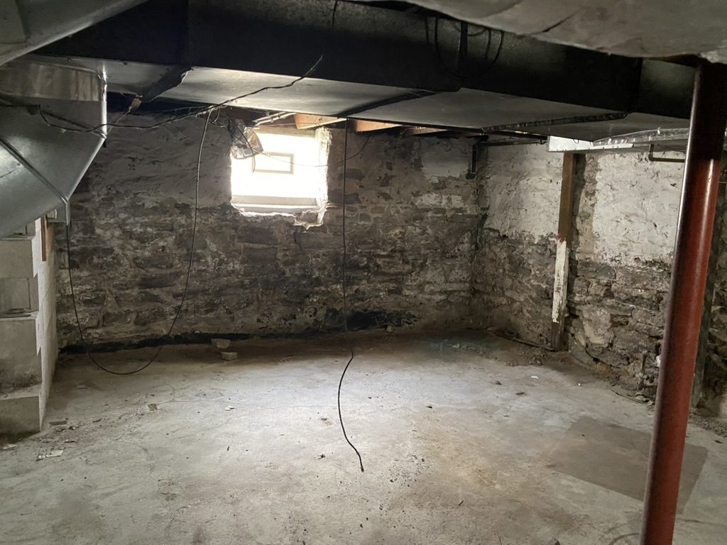 Empty stone basement room