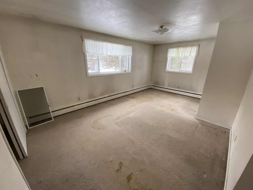 Empty room with two windows
